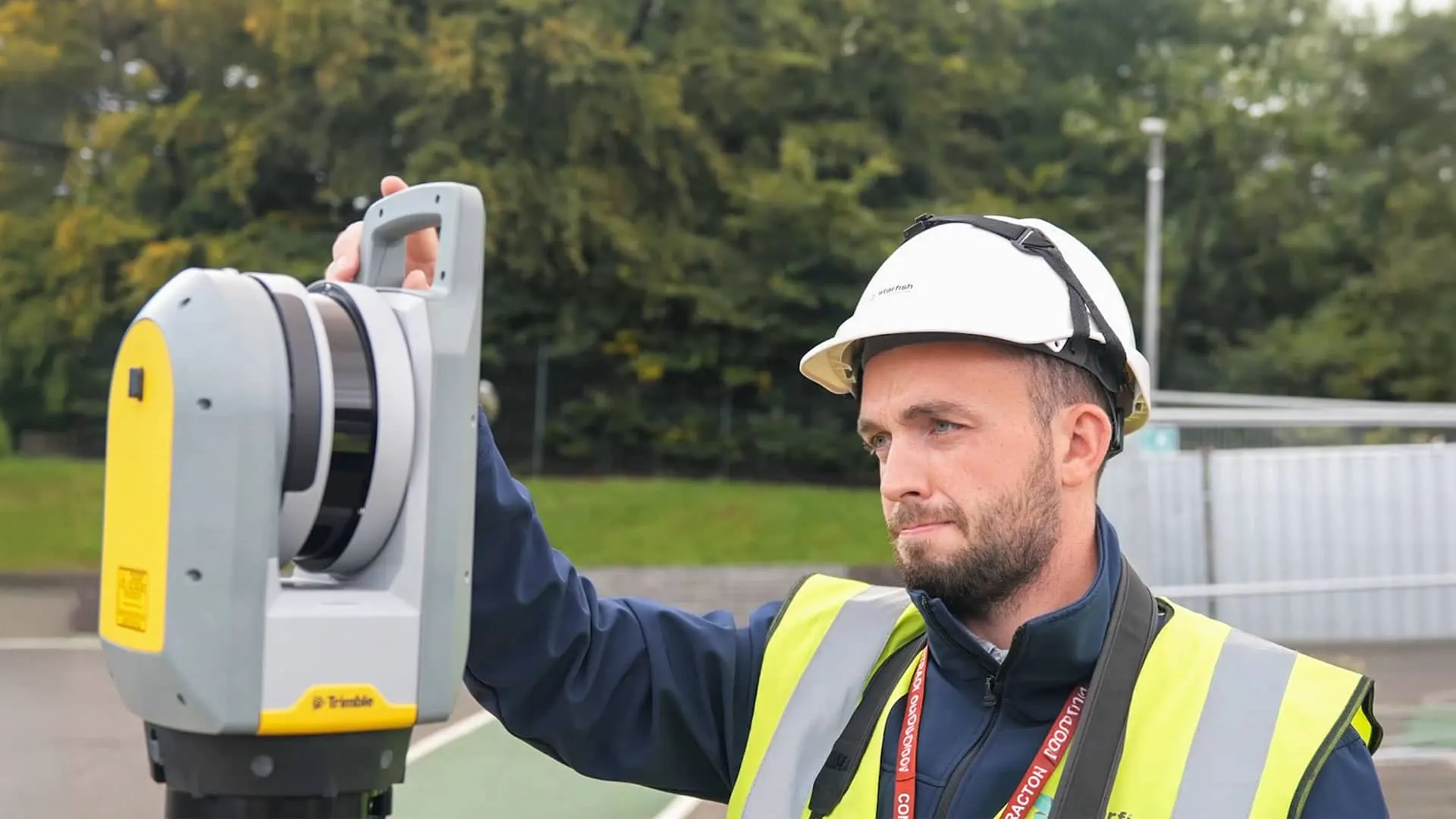Starfish Construction surveyor setting up a 3D laser scanner on site