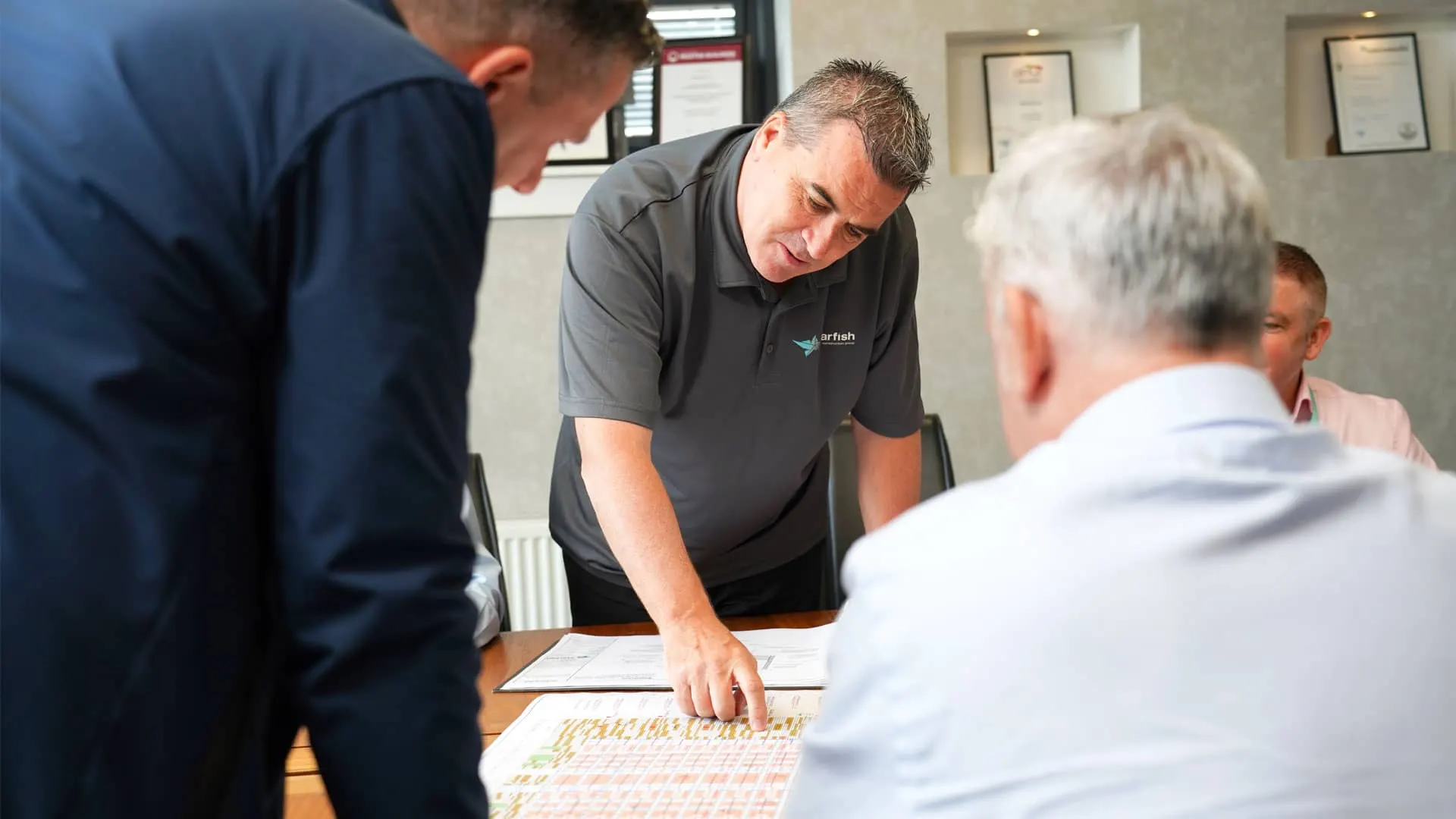 Starfish Construction team reviewing a project programme