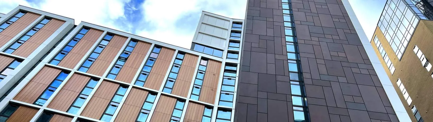 Rainscreen façade panels and windows on a residential building