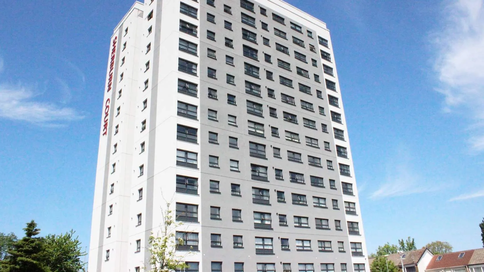 Residential tower after envelope remediation