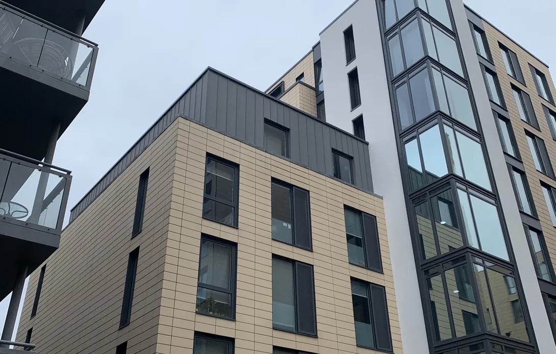 Completed Glassyard exterior with new render, zinc panels and glazed corner