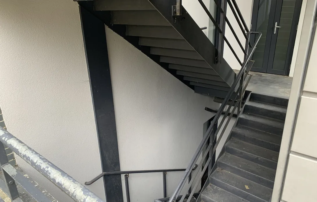 Replaced render system in an external stairwell at Glassyard