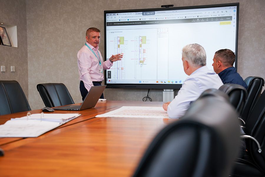 Joe Hulley chairing a raac project review meeting