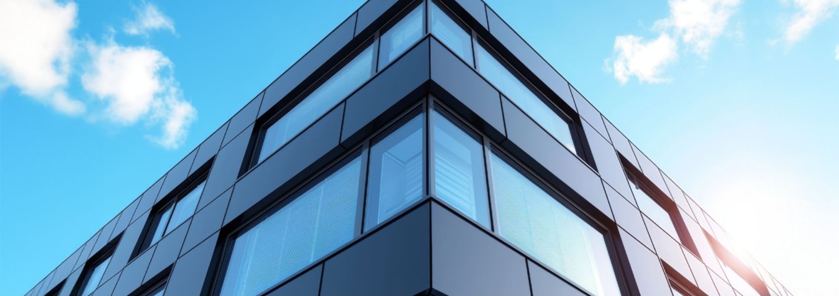 Commercial building with fire resistant cladding panels.