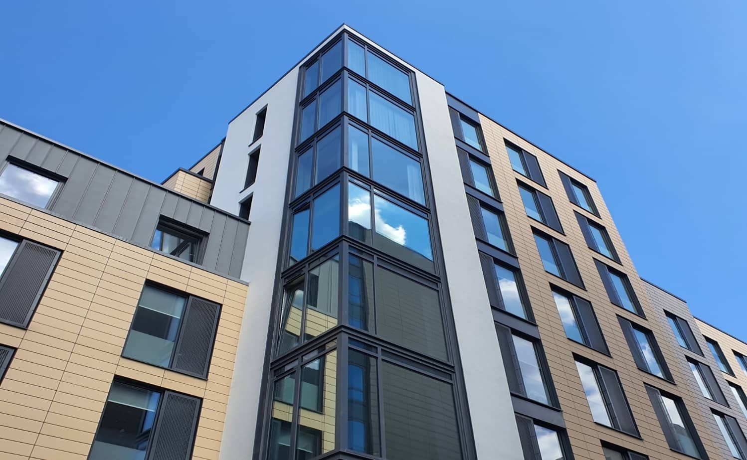 glass building against a blue sky