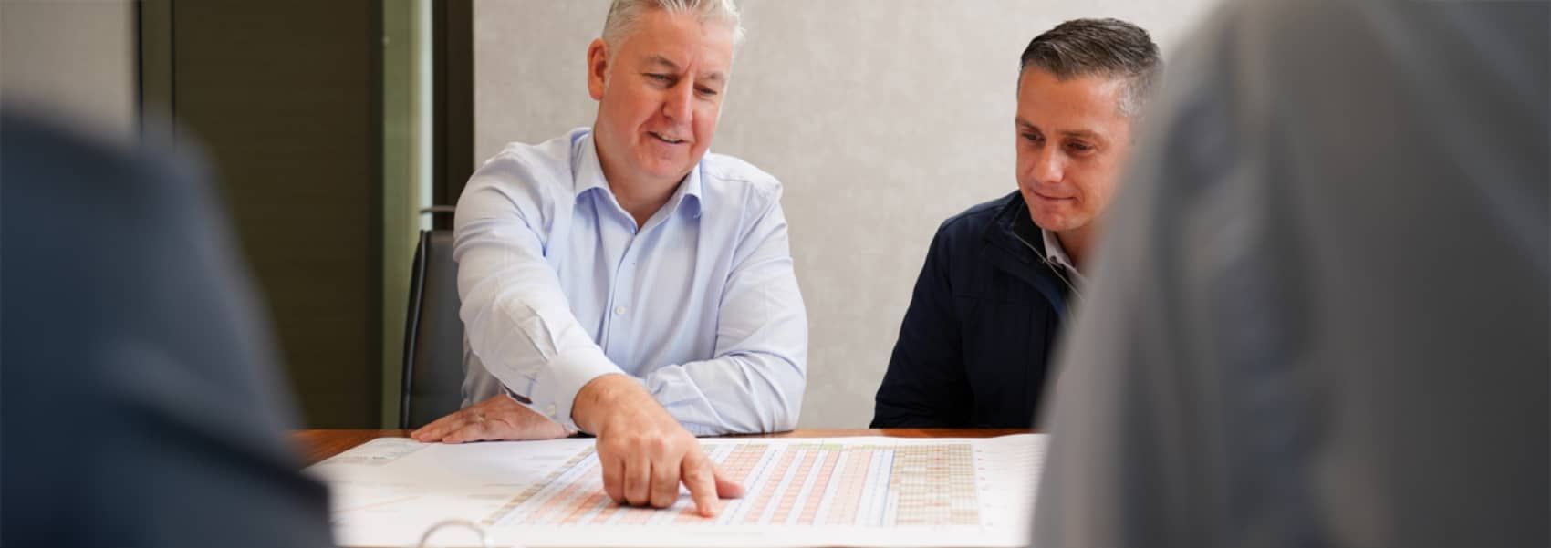 Starfish Construction design consultants discussing a new façade project.